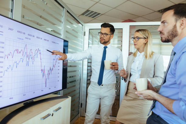 istock Businessman presenting business development in a meeting in the office 1158134938