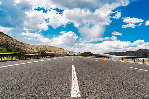 Highway with cloudy blue sky near Ankara, Turkey