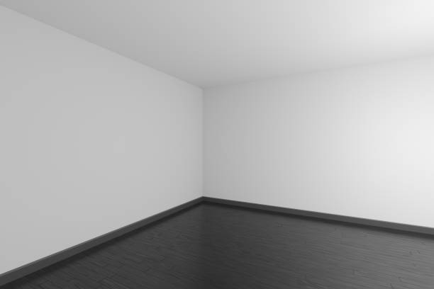istock White empty room with black wood parquet floor. 1158136567