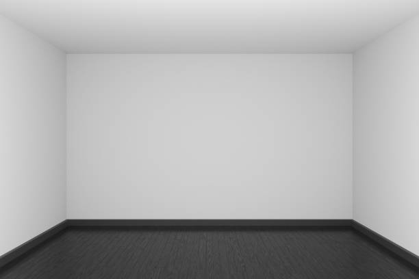 istock White empty room with black wooden parquet floor 1158136591