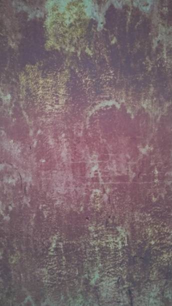 istock Old metal wall damaged by rust. Close-up. 1158139030