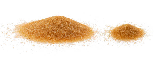 istock Brown sugar isolated on white background with clipping path 1158139410