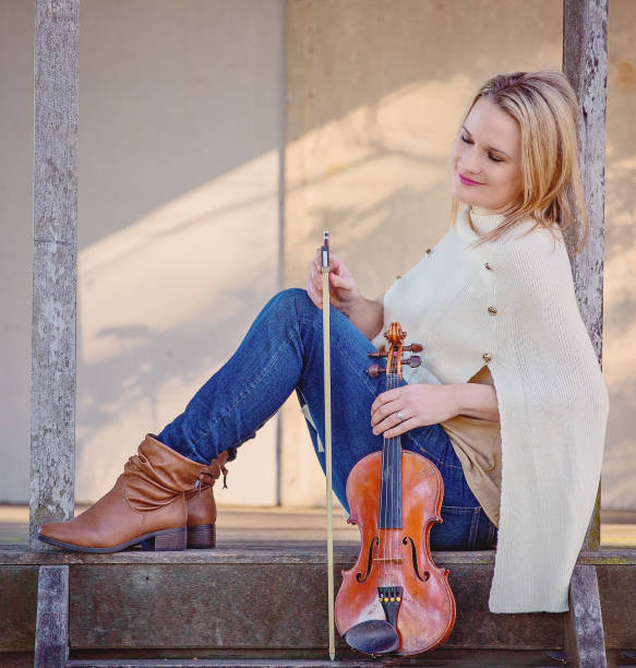 istock Beautiful Woman With Vintage Violin 1158148104