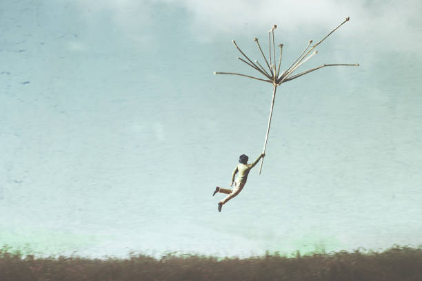 surreal man flying free in the sky
