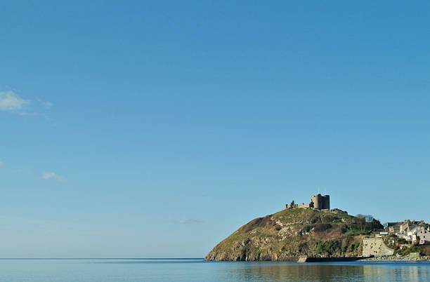 istock Tranquil sky calm sea and ruined castle 115814994