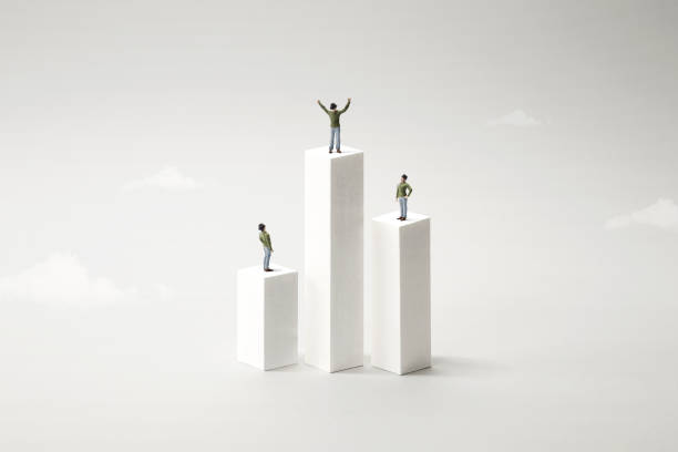 istock people standing on a podium, celebrating victory 1158150034