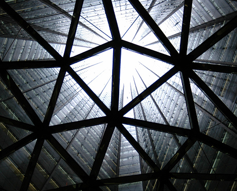 Shot from the inside of the Sumitomo Bldg (skyscraper in Shinjuku, Tokyo). This 54 floors high building is constructed as a triangle. From the basement floor you have an endless view towards the sky.