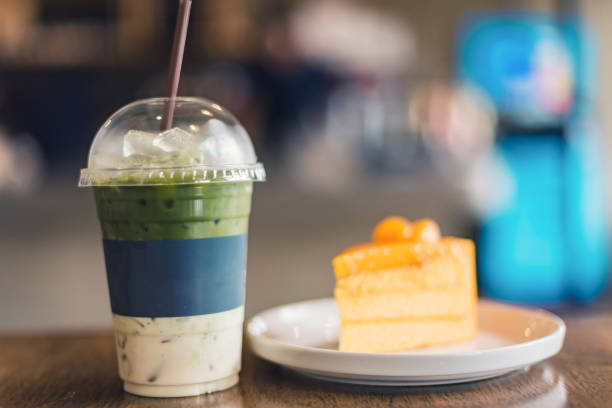 Orange cake and iced matcha green tea latte with milk