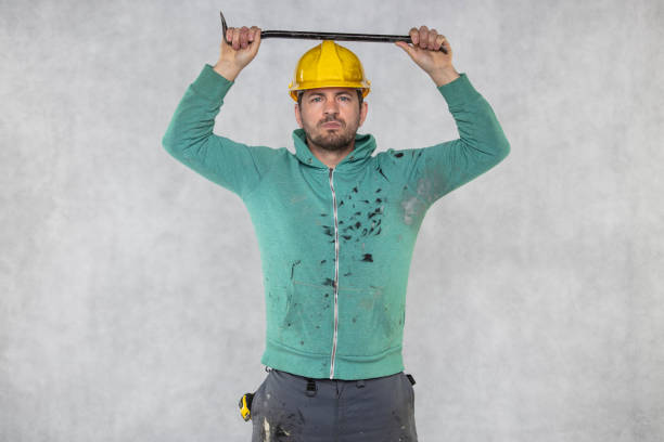 Construction worker building home (panoramic). Great for website or print header with ample copy space.
