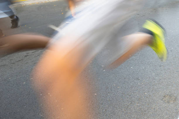istock Blur, marathon running race, young people running 1158159194