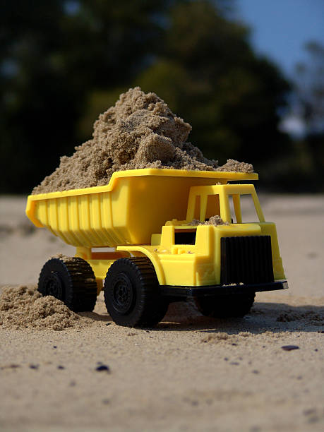 istock Toy Dump Truck on Beach 115816334