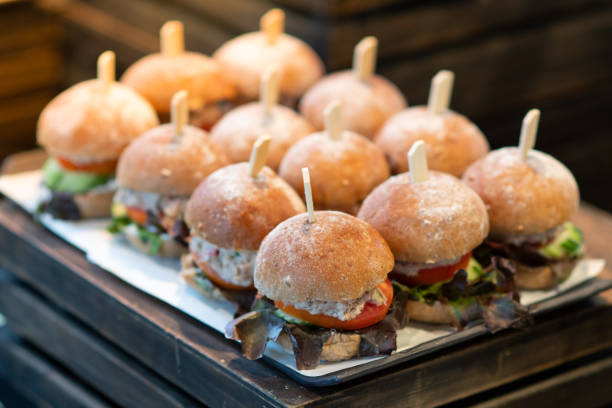 The appetizing burger is placed in a light buffet. stock photo