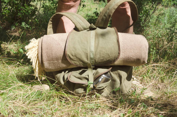 istock Closeup of backpack and blanket, traveller have a short rest after long walk 1158164348