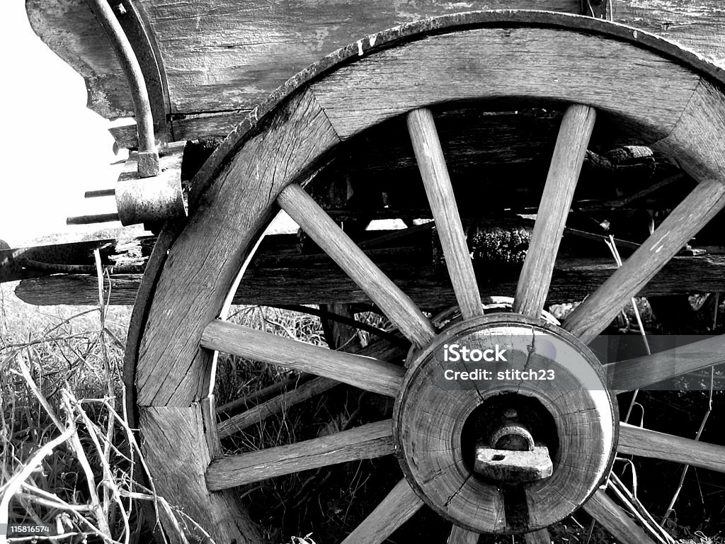 The Wheel of Time Broken down rusted horse-drawn cart. Abandoned Stock Photo