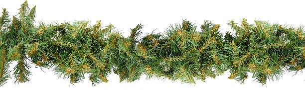 Christmas ornamental garland2 An artificial ornamental garland to use in Christmas decoration. evergreen garland stock pictures, royalty-free photos & images
