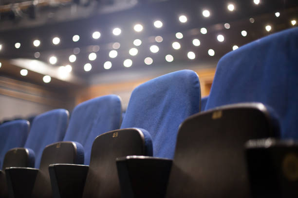 istock Low Angle View Of Empty Chairs In Auditorium 1158166497