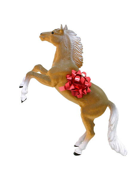 istock Toy Horse w/Bow Isolated on White 115817051