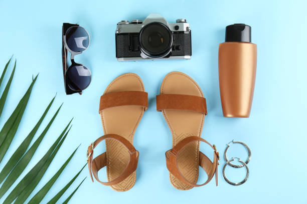 istock Feminine background with female items over bright colored paper. 1158171689