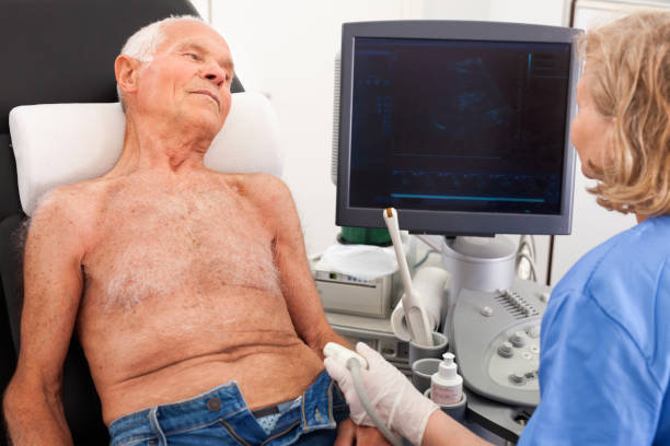 istock Female technician diagnosing male patient using modern ultrasound scanner in private clinic 1158172254