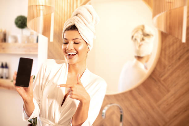 istock Young beautiful woman in bathroom. 1158172611