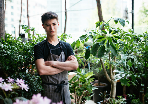 Millennial Korean man running flower shop business