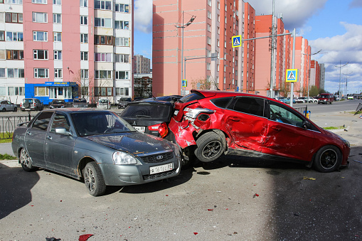 Novyy Urengoy, Russia - June 20, 2019: Crashed cars Lada Priora and Ford Focus in the city street.