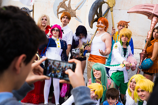 Lucca, Italy, 03/11/2018: Funny colplayers dressed as Japanese manga characters photographed during a carnival