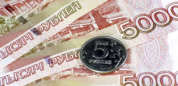 istock stack of money bond and coin 1158180362