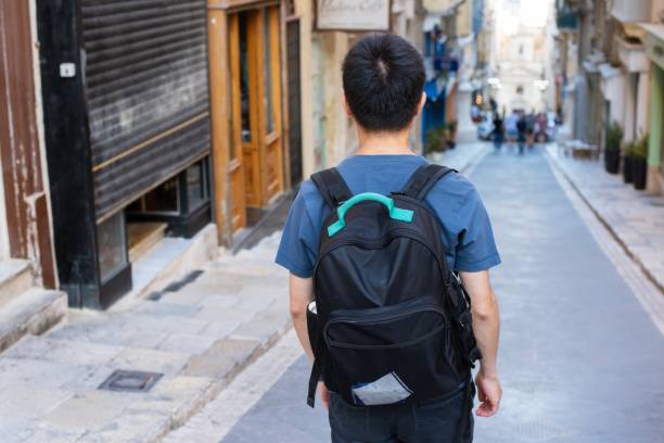 istock Traveler exploring his destination on foot 1158181950