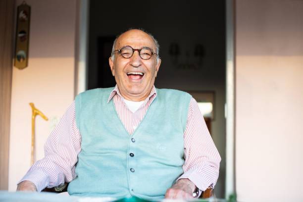 istock Portrait of older man laughing 1158182050