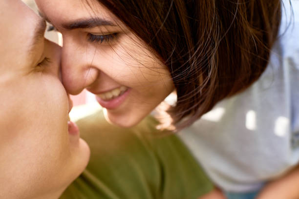 istock Happy young couple touching noses 1158183311