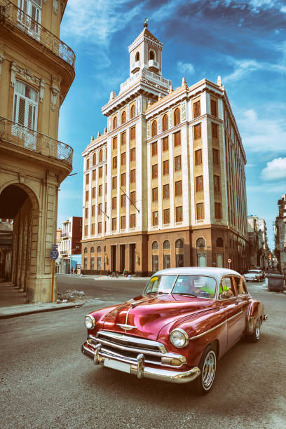 istock Vintage oldtimer car driving through Old Havana Cuba 1158186430