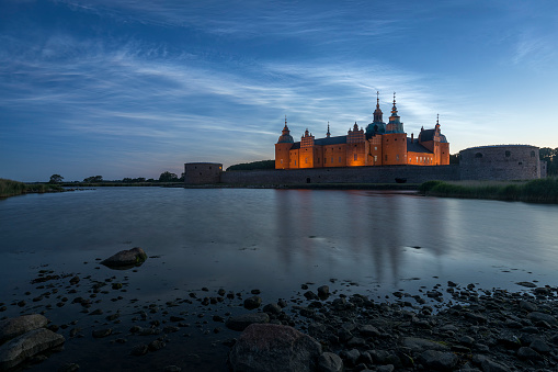 Kalmar Castle in Sweden at sunset with a moonlit sky
