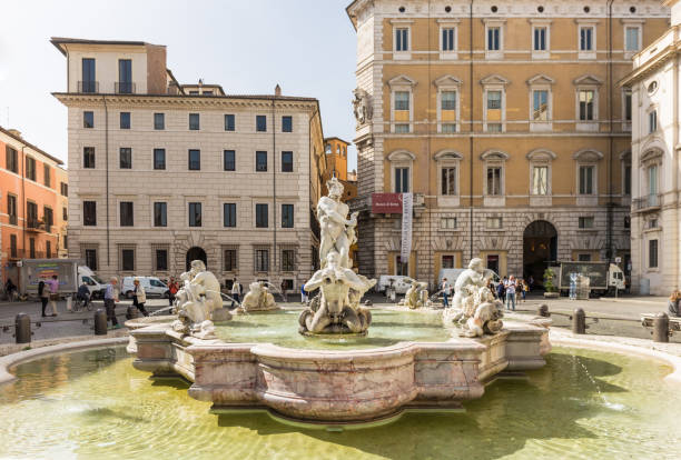 ROME, ITALY - APRIL 24, 2019: The Moor Fountain (Italian: Fontana del Moro) in Navona Square. View of the Fountain of Moor Fountain is a fountain in Rome. It is located at the south end of the Piazza Navona fontana del moro stock pictures, royalty-free photos & images