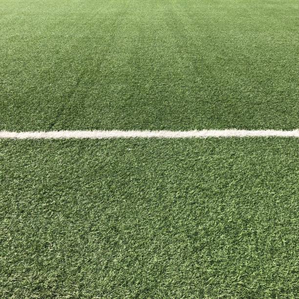 istock Paint lines on a grass Football pitch square 1158190134