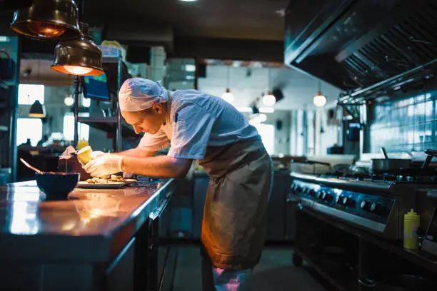 Photo of Chef serving food