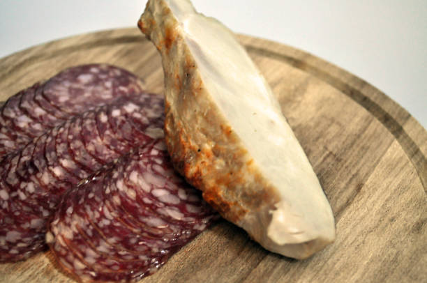 istock meat and sausages on wooden background 1158191771