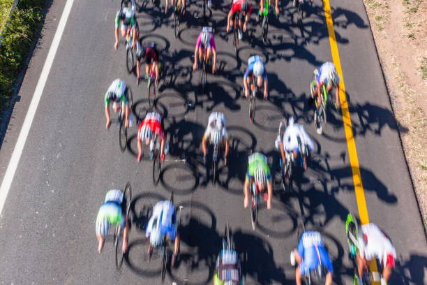 istock Road Race Cycling Cyclists Motion Blur Overhead 1158193039