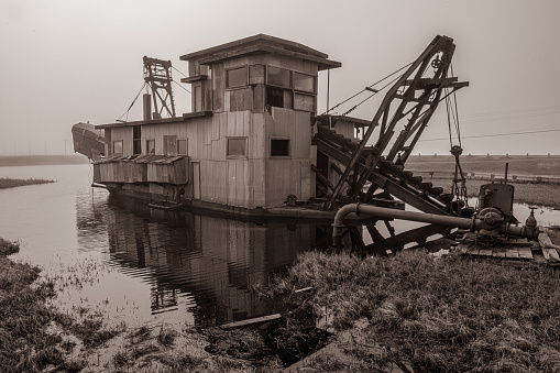 The historic Swanberg Dredge once used to mine gold in Nome Alaska.