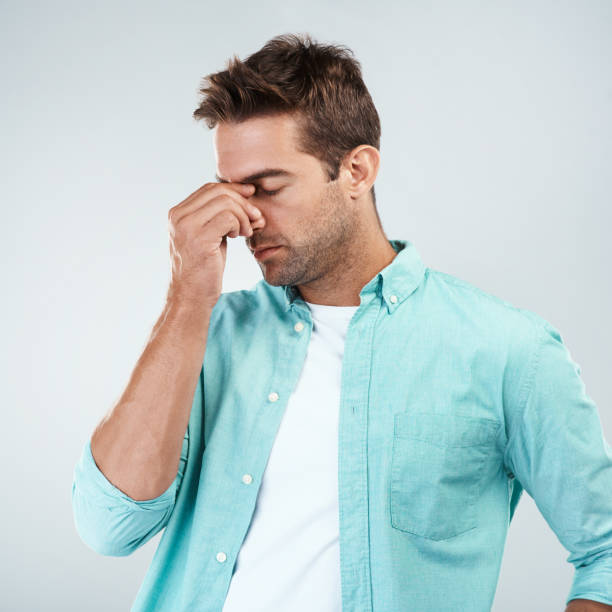 istock My head is hurting too much today 1158195791