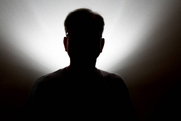 istock Male shadow portrait 1158195961