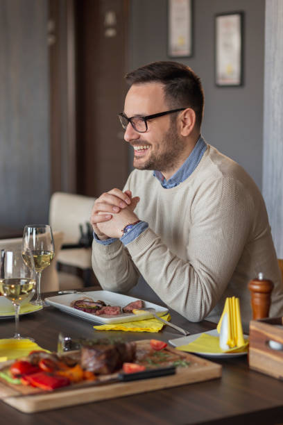 istock Man on a date at a restaurant 1158197531