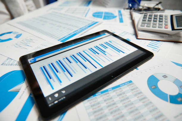 istock Office workspace for business. Tablet pc and reports. Table closeup. Business financial accounting concept. 1158197535