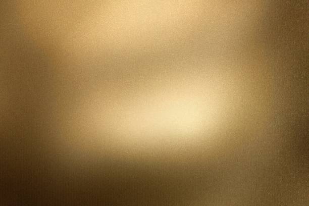 istock Glowing brushed bronze metallic wall, abstract texture background 1158197918