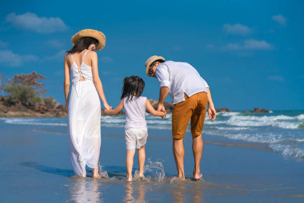 istock family on the beach 1158200858