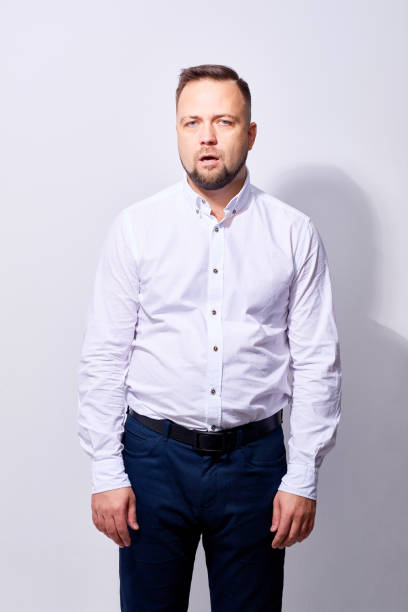 istock Bored adult man looking at camera 1158201720