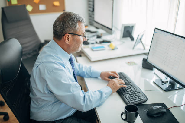 istock Senior businessman at the office 1158201922