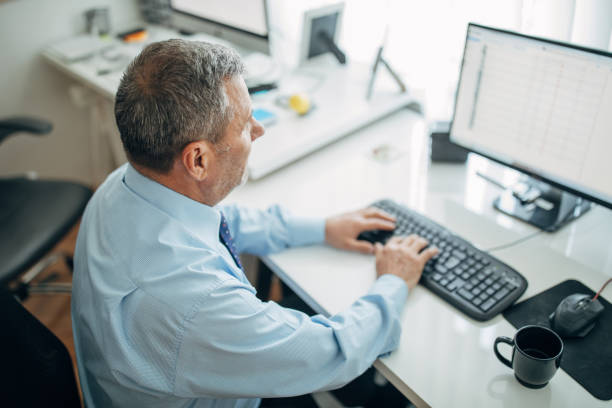 istock Senior businessman at the office 1158201966