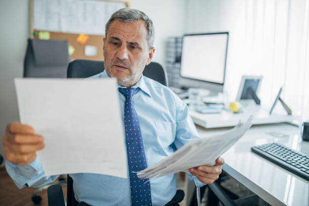 istock Senior businessman at the office 1158202044