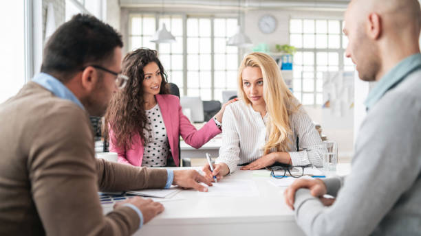 istock Female manager discussing business 1158204070